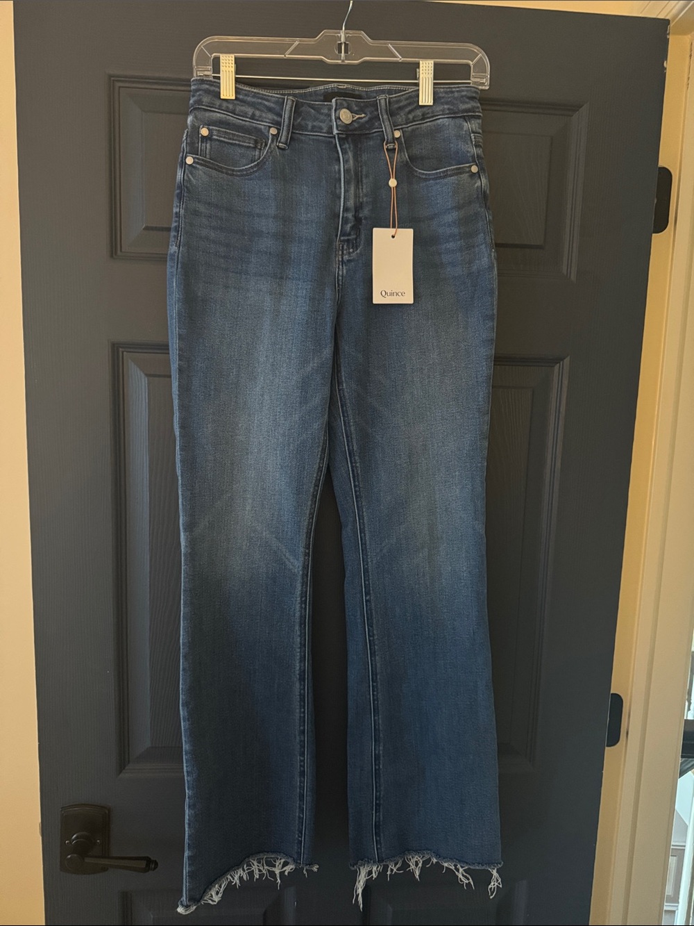 Quince Women's Dark Indigo Flare Jeans with Raw Hem